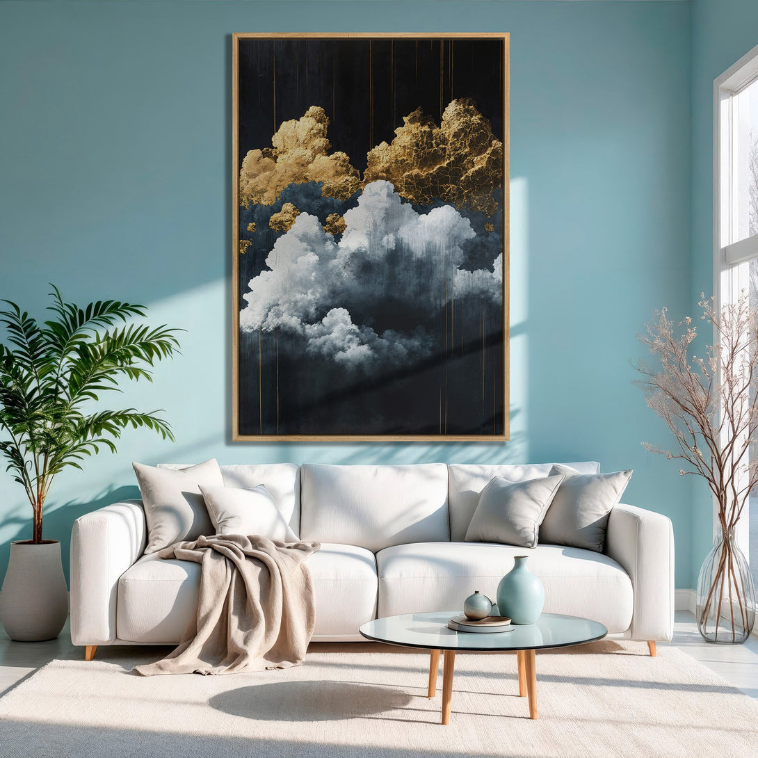 Framed Wall Art featuring abstract gold and white clouds on a dark background. Modern art with a neutral color palette, perfect for living room decor.