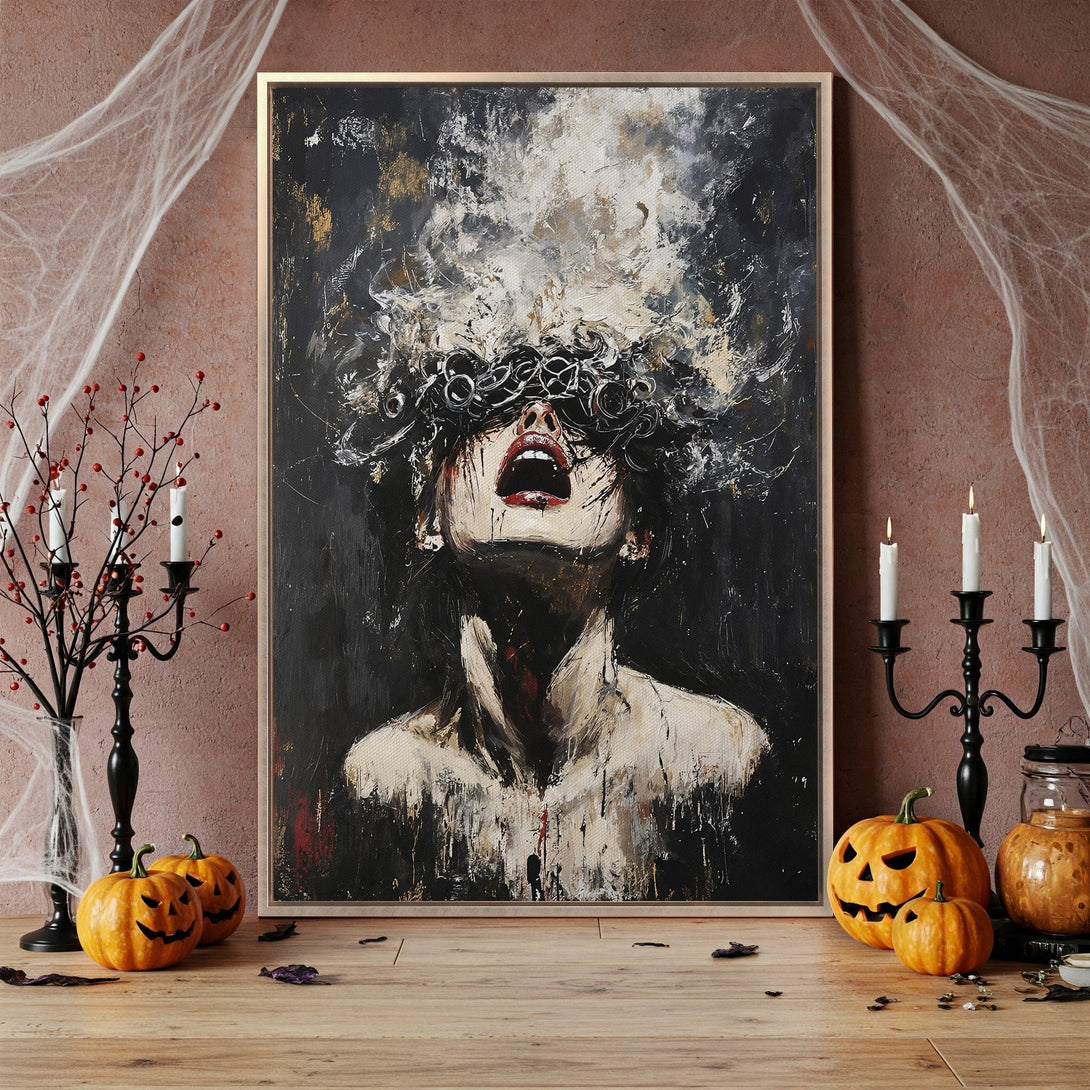 Framed Wall Art: Abstract portrait in dark, moody tones. Dramatic canvas print featuring a woman's face with black, white, and red hues. Perfect for Halloween decor.