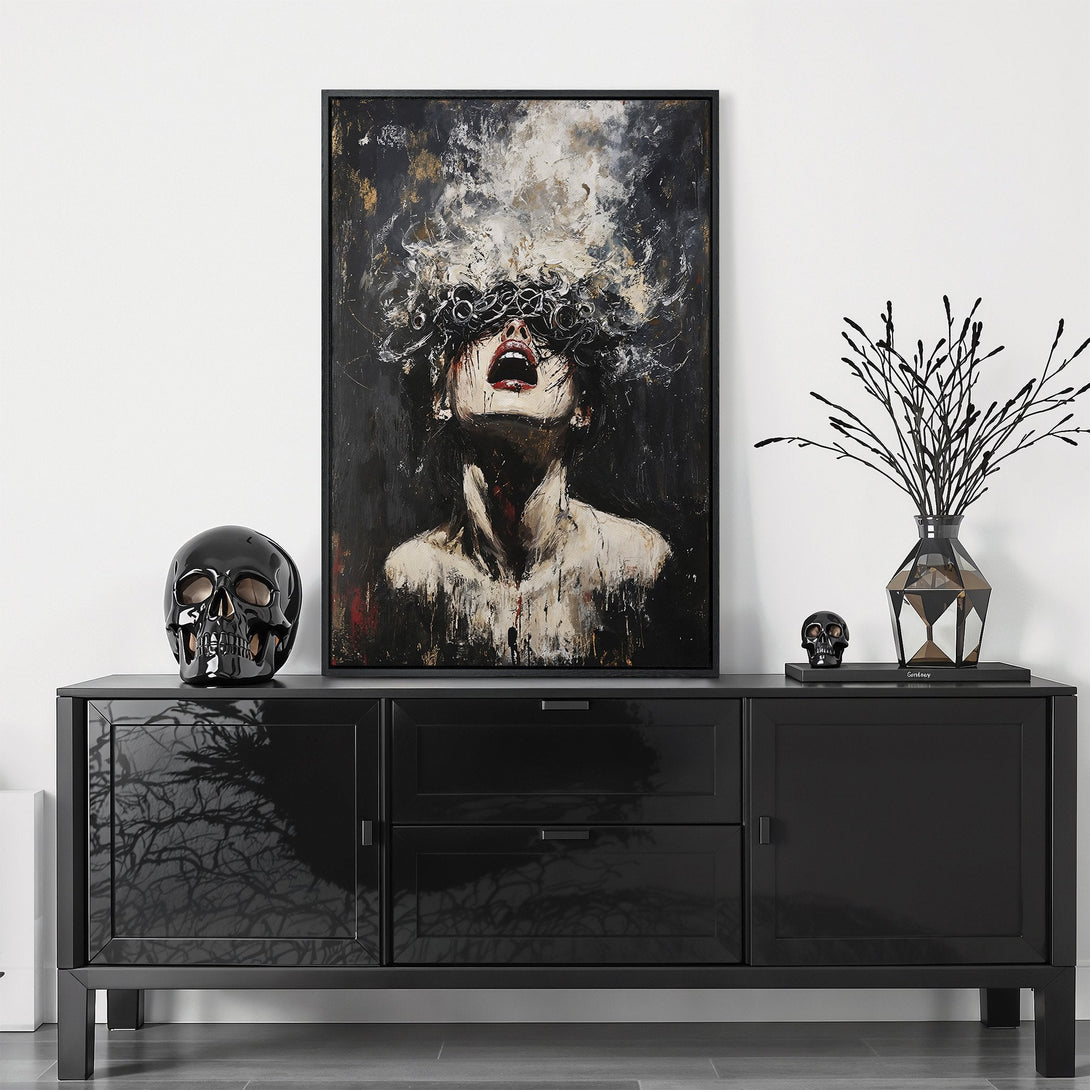 Framed Wall Art featuring an expressive woman in a dark, abstract style. Dramatic black, white, and gold color palette. Perfect for modern home decor.
