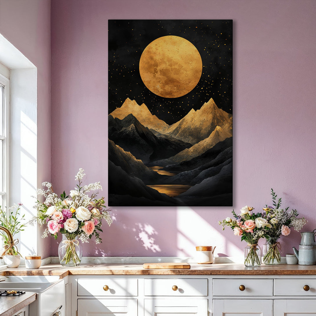 Framed Wall Art featuring a stunning gold moon and mountain landscape in a modern, abstract style. The artwork's color palette is rich with gold and black.