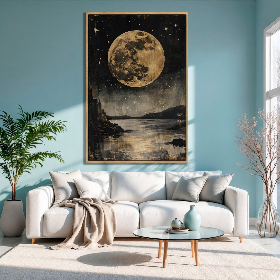 Framed Wall Art featuring a stunning moonlit landscape. Moody, artistic style with a black, gold, and neutral color palette. Perfect for living room decor.