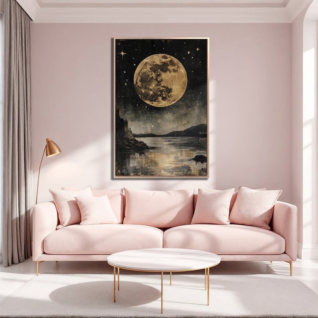Framed Wall Art featuring a celestial moonlit landscape in gold and black tones, displayed in a blush pink interior. Enhance your home decor!