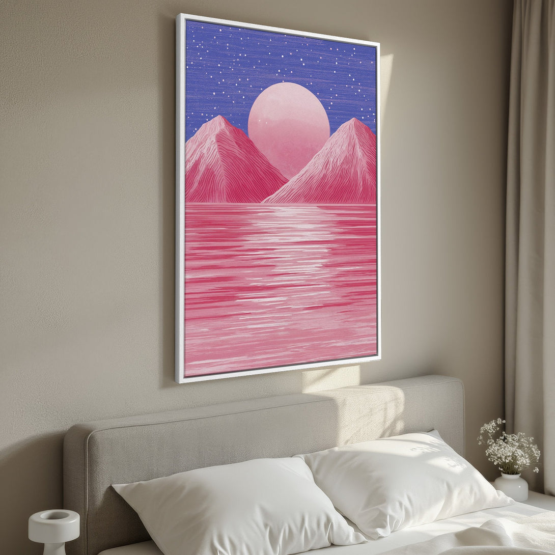 Framed Wall Art featuring a vibrant pink landscape with mountains and a moon. Modern art style with a dreamy, pink and blue color palette. Perfect bedroom decor.