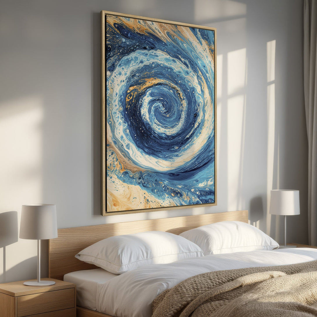 Framed Wall Art: Abstract blue and gold swirl canvas print. Modern art for bedroom decor. Enhance your space with this stunning piece!