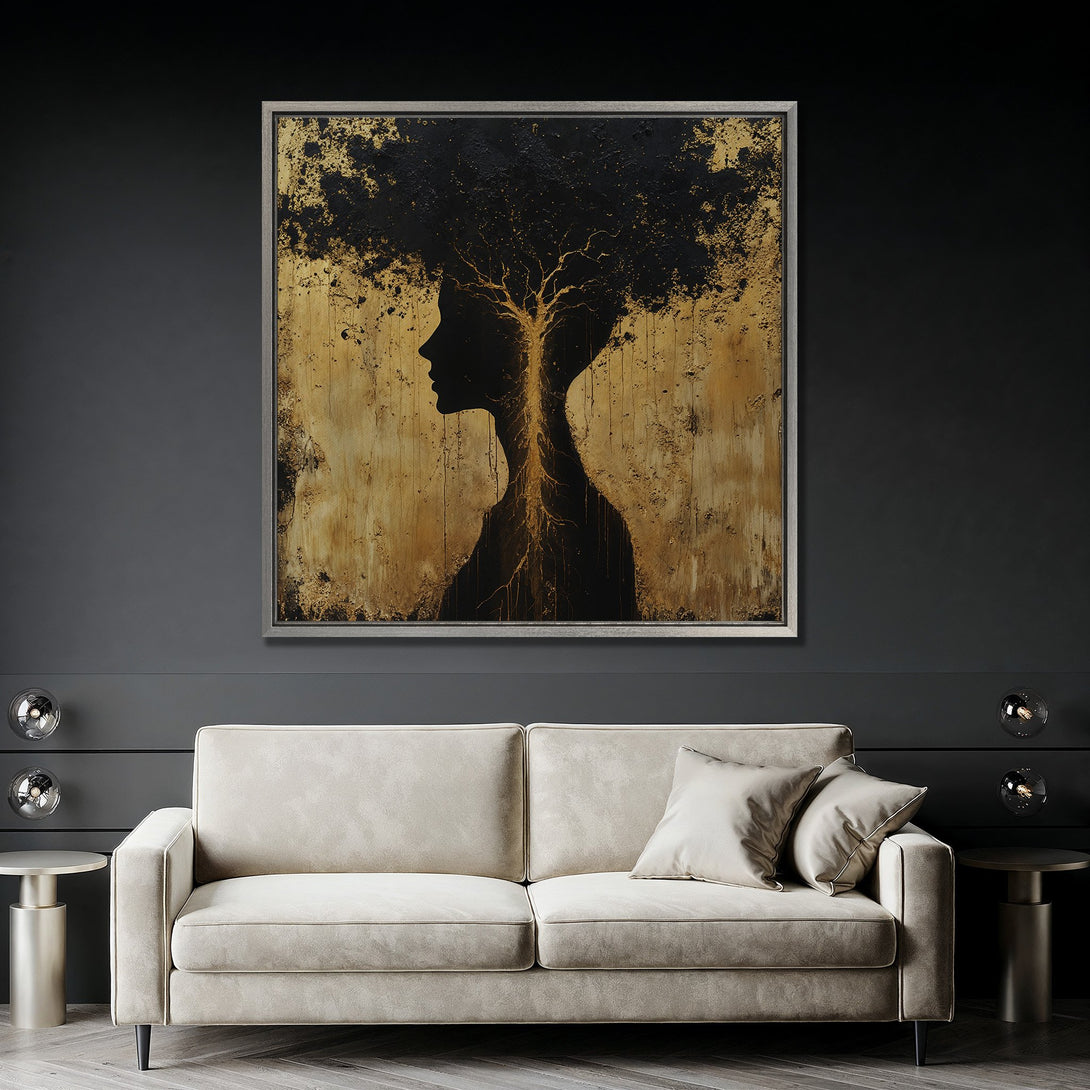 Framed Wall Art featuring a silhouette with tree-like hair, in black and gold tones. Modern abstract art to elevate your home decor.
