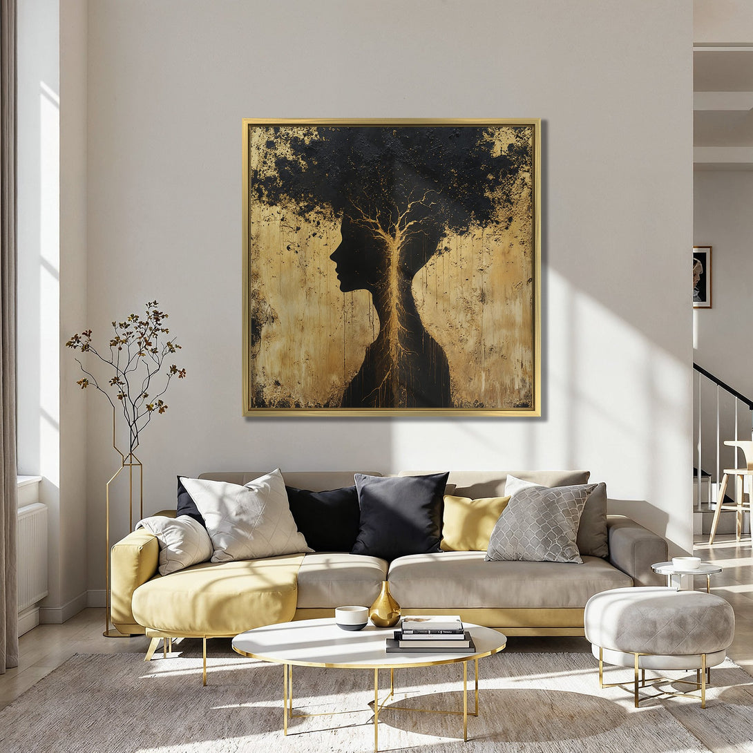 Canvas Print of a woman's silhouette with a tree-like design, gold and black abstract art. Modern decor with warm tones.