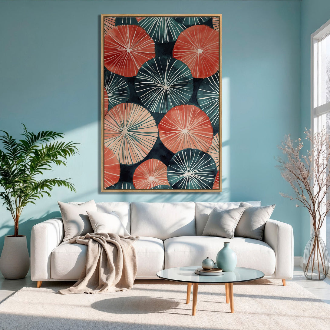 Framed Wall Art featuring abstract floral design in coral, teal, and navy. Modern canvas print adds a pop of color to a stylish living room.