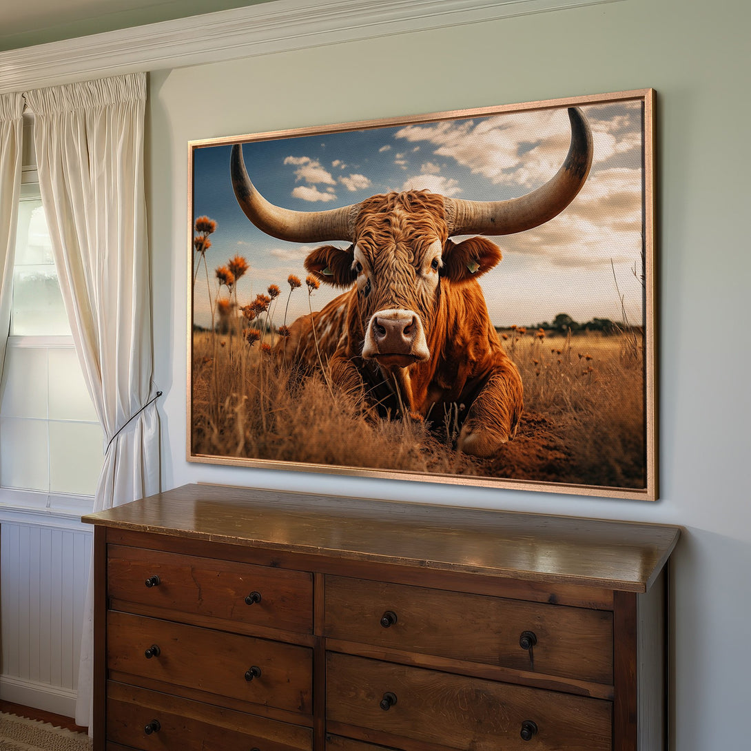 Framed Wall Art: Majestic longhorn bull canvas print in warm earth tones. Rustic decor for a cozy home. Shop now!