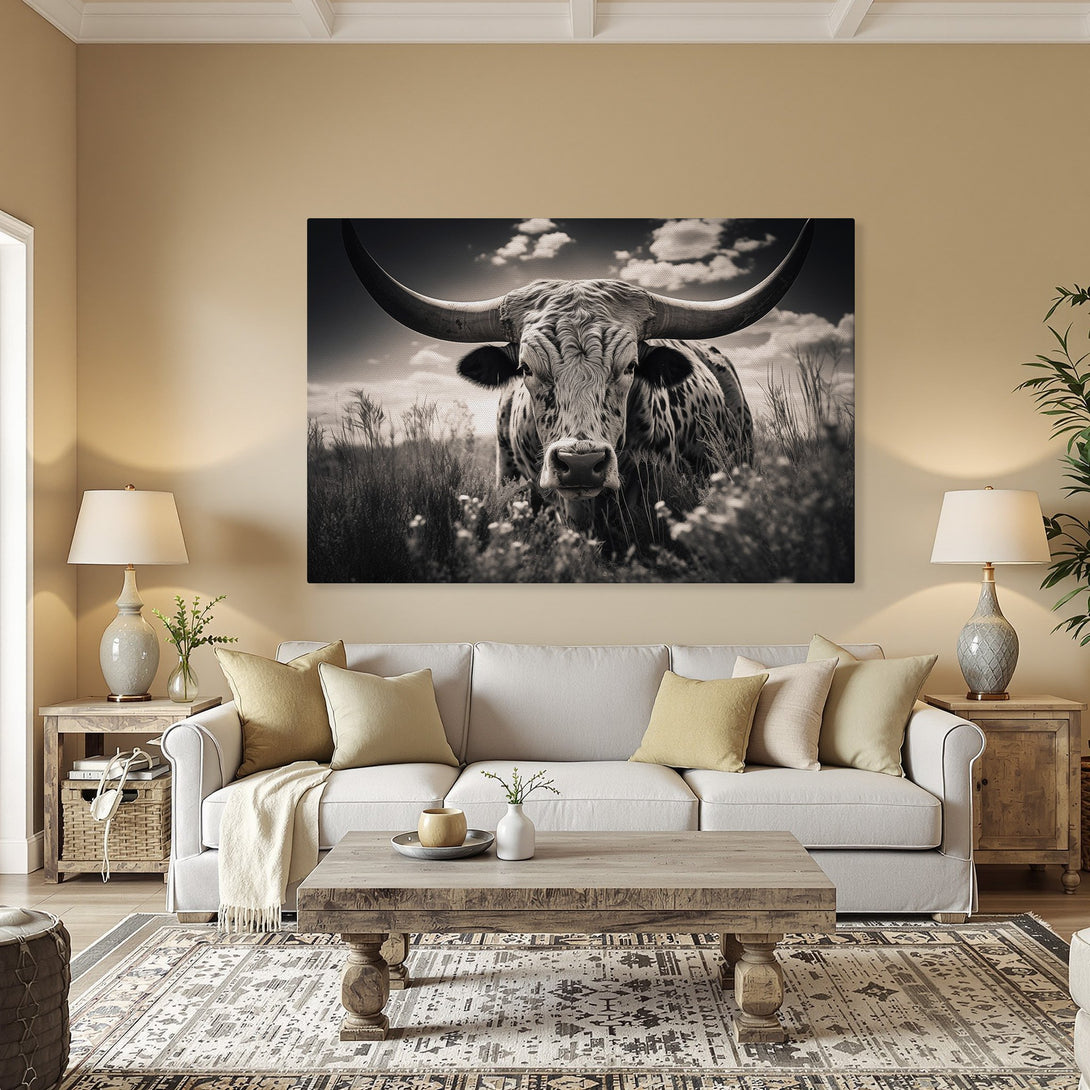 Framed Wall Art: Majestic black and white longhorn bull canvas print. Rustic decor with a neutral color palette, perfect for a farmhouse or western aesthetic.