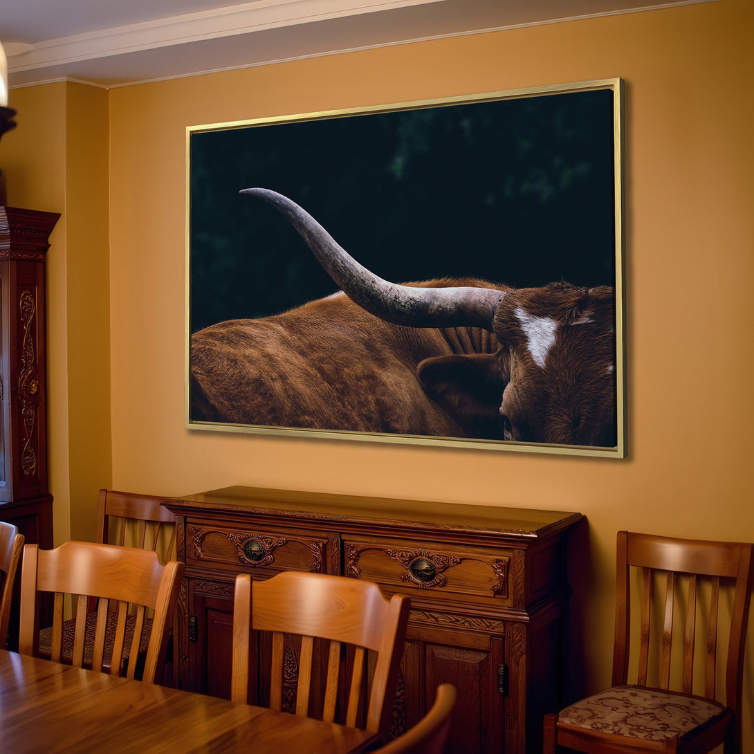 Canvas Print of a longhorn bull in a dark, moody style. Earthy tones of brown and beige create a warm, rustic aesthetic for your home.