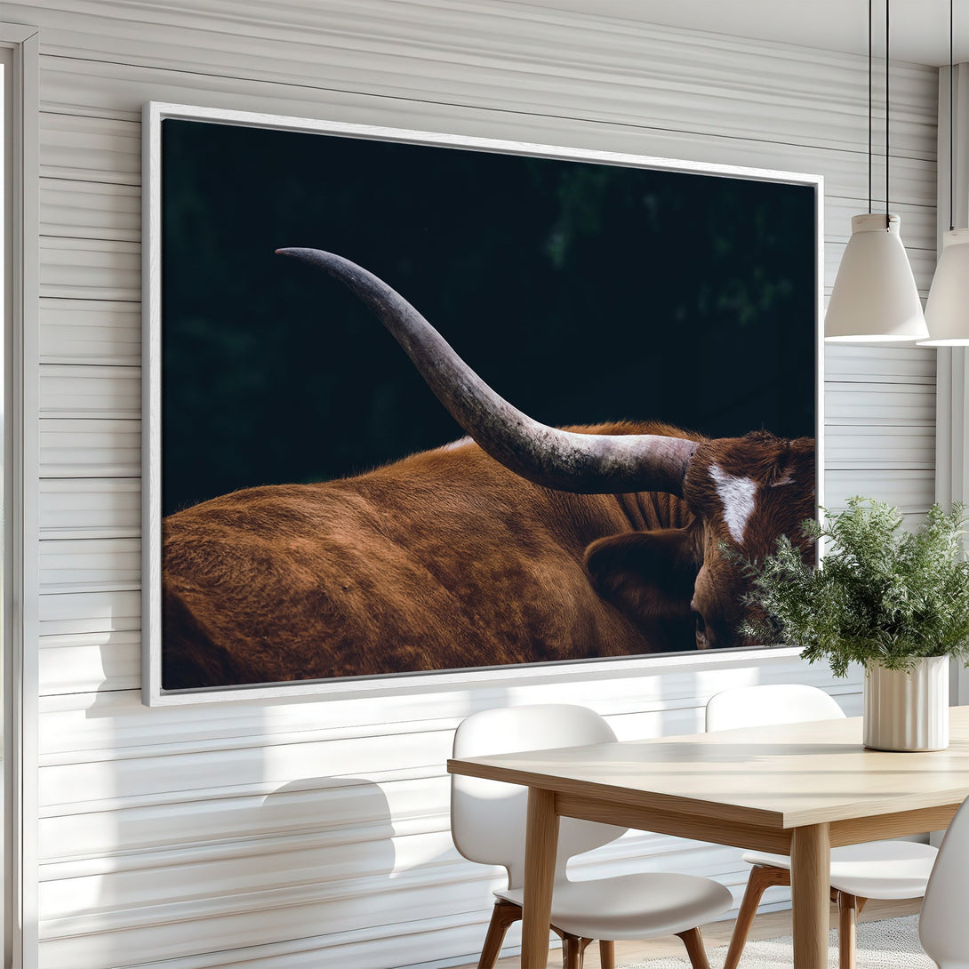 Framed Wall Art: Close-up of a Texas Longhorn. Rustic style with warm brown and deep green tones. Perfect for adding a touch of nature to your home.