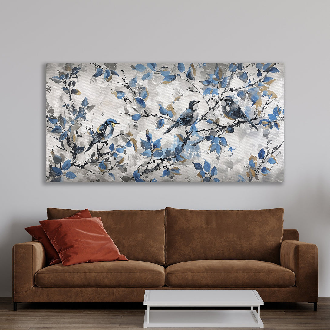 Framed Wall Art featuring birds on branches in blue and gray tones. Perfect for adding a touch of nature and elegance to your home decor.