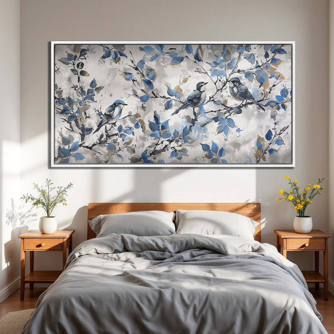Framed Wall Art featuring birds on branches, a watercolor style painting with blue, gray, and gold hues. Perfect bedroom decor.