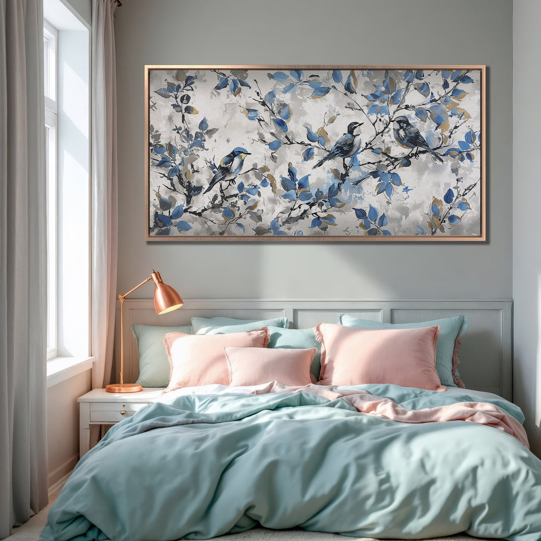 Framed Wall Art featuring birds on branches, in a soft blue, gray, and gold palette. Perfect bedroom decor!