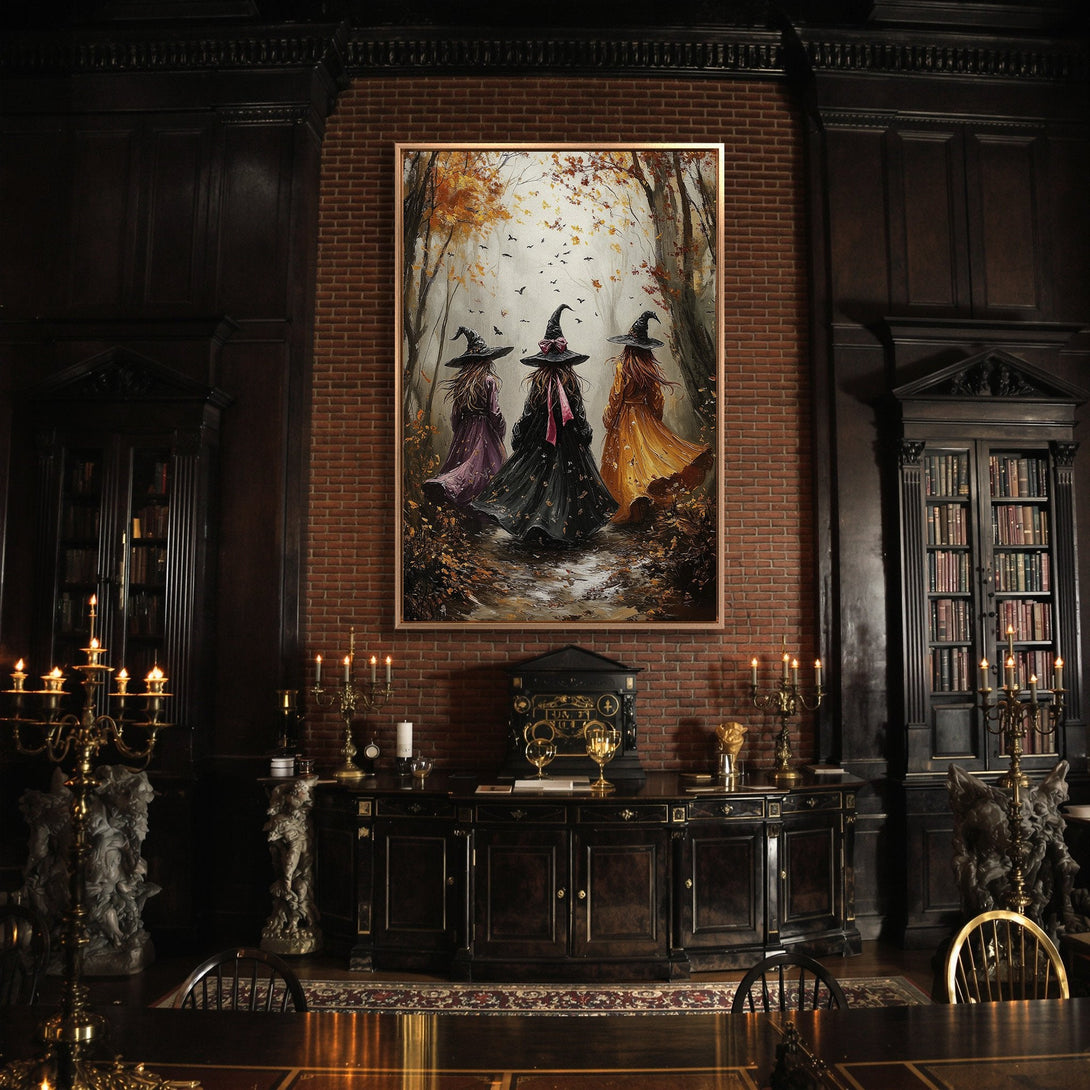 Framed Wall Art: Witchy scene in autumn colors. Canvas Print of three witches in a forest, perfect for Halloween decor. Warm tones.