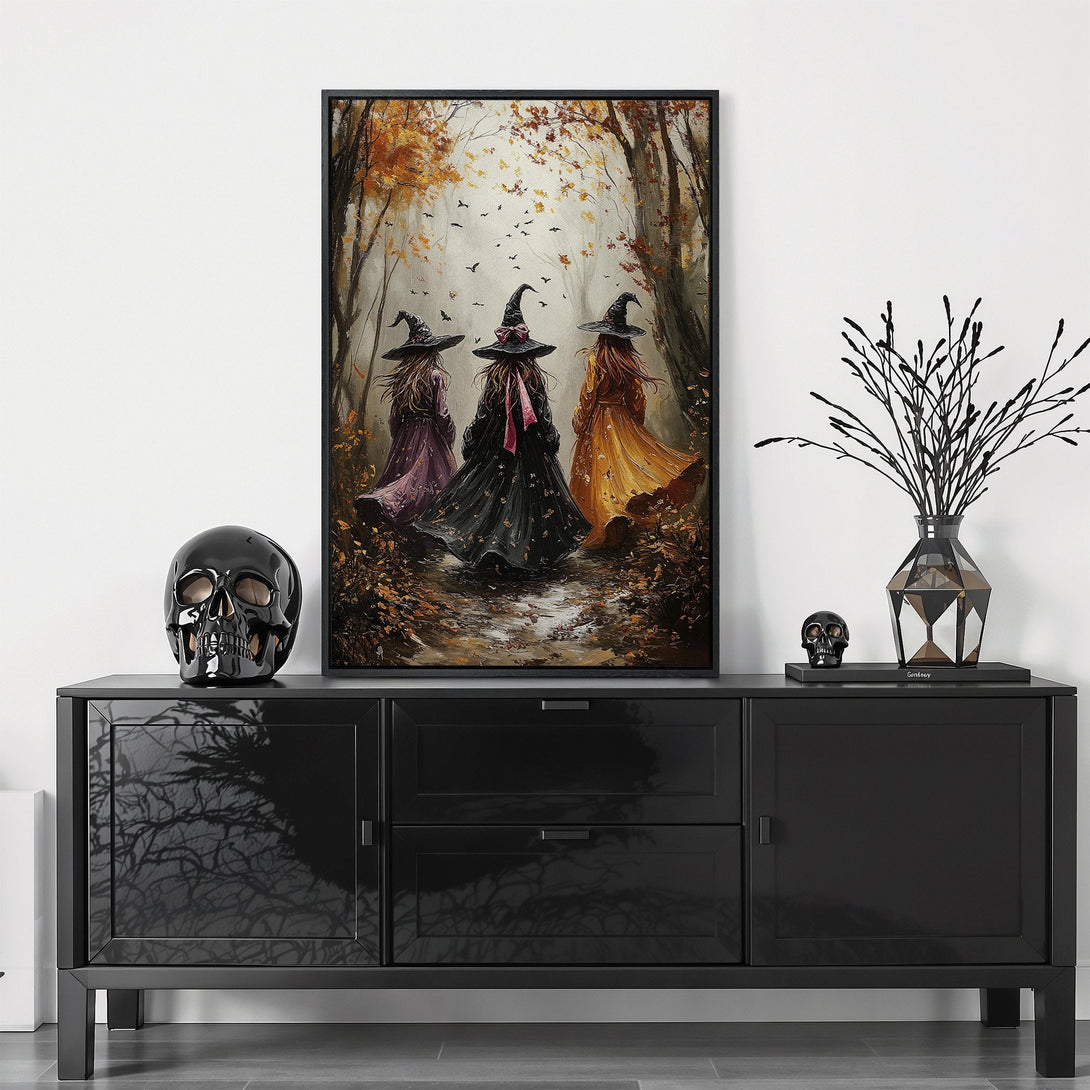 Framed Wall Art: Enchanting witch art print in autumnal hues. Perfect for Halloween decor! Features a forest scene with witches in a warm, inviting color palette.