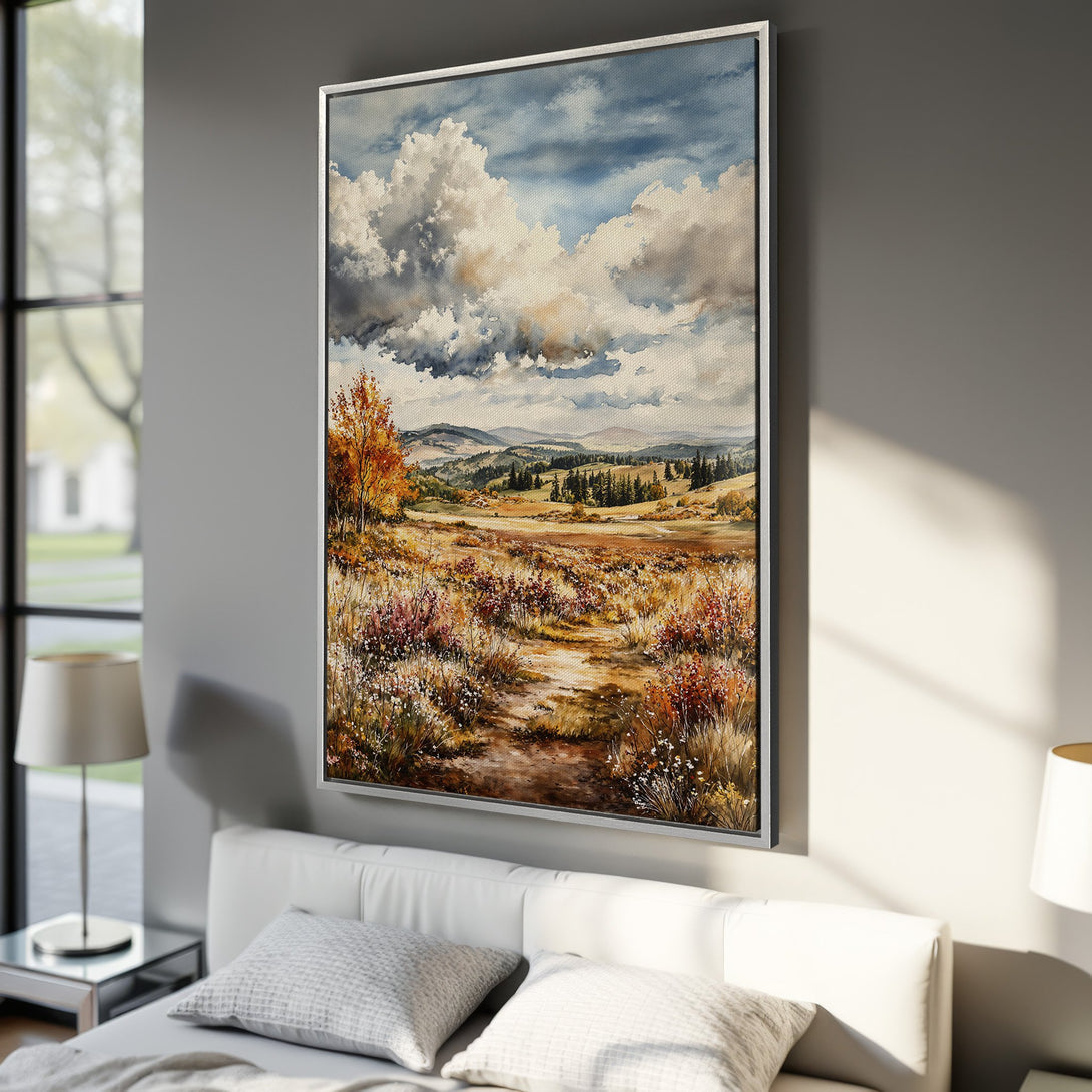 Framed Wall Art: Watercolor landscape Canvas Print with warm earth tones and dramatic clouds, perfect for bedroom decor.