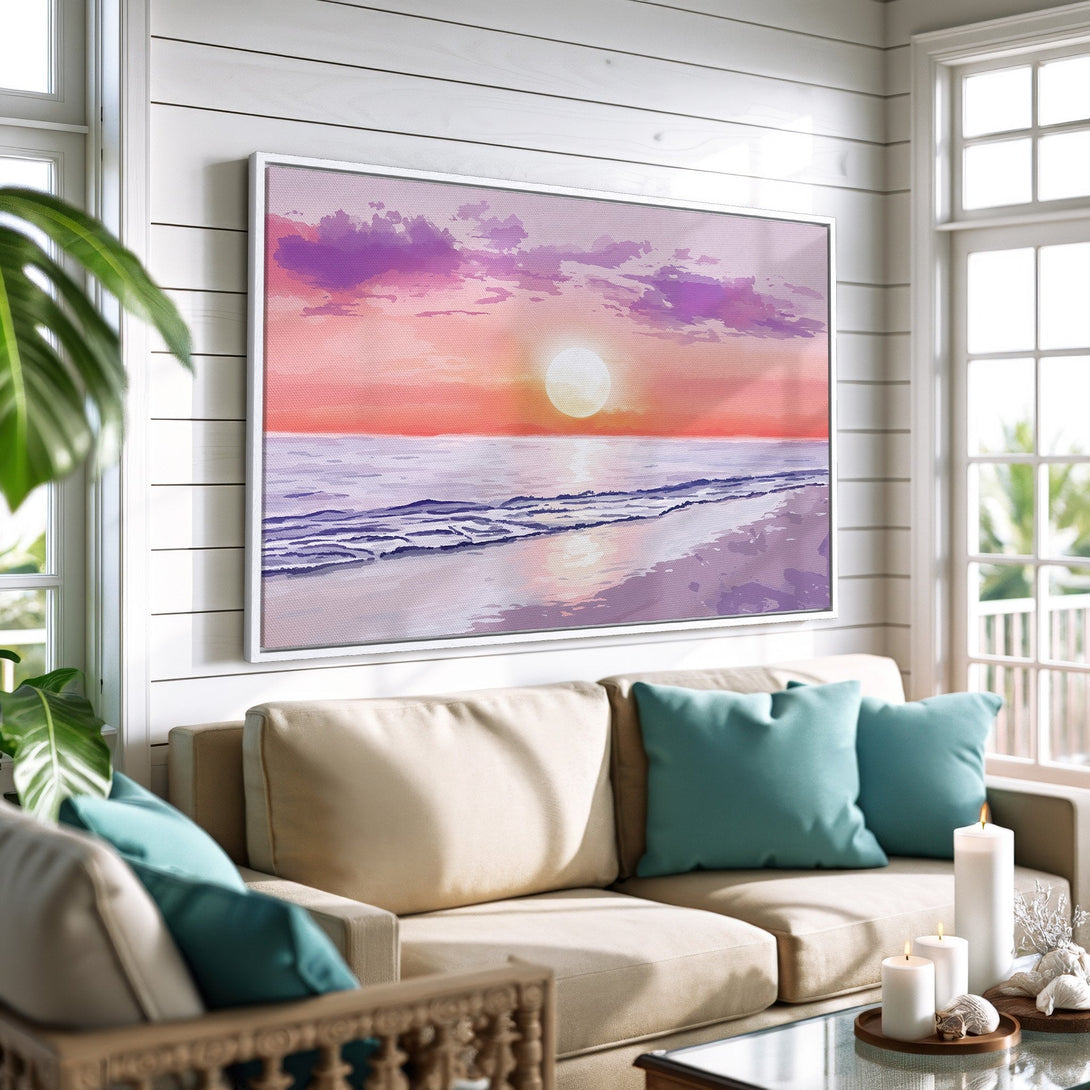 Framed Wall Art: Sunset beach scene canvas print in a coastal living room. Features warm sunset colors and cool teal accents.