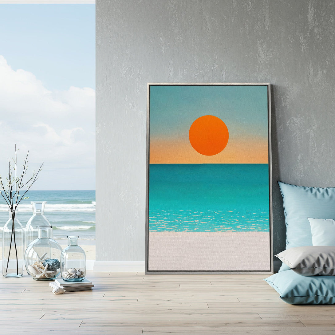 Framed Wall Art featuring a vibrant sunset over the ocean. Coastal-inspired artwork with a minimalist style and a calming teal, orange, and white color palette.