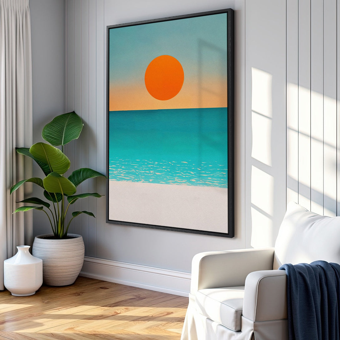 Framed Wall Art featuring a minimalist beach scene with an orange sun, turquoise water, and white sand. Coastal style with a calming blue and orange palette.
