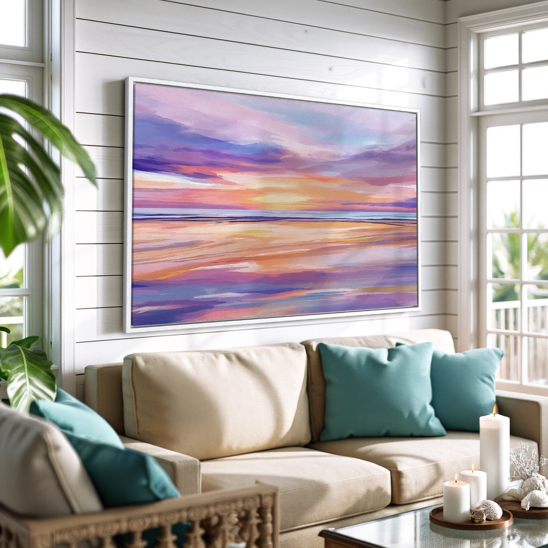 Framed Wall Art: Abstract sunset canvas print in a coastal living room. Featuring a vibrant palette of purples, oranges, and blues. Perfect for home decor.