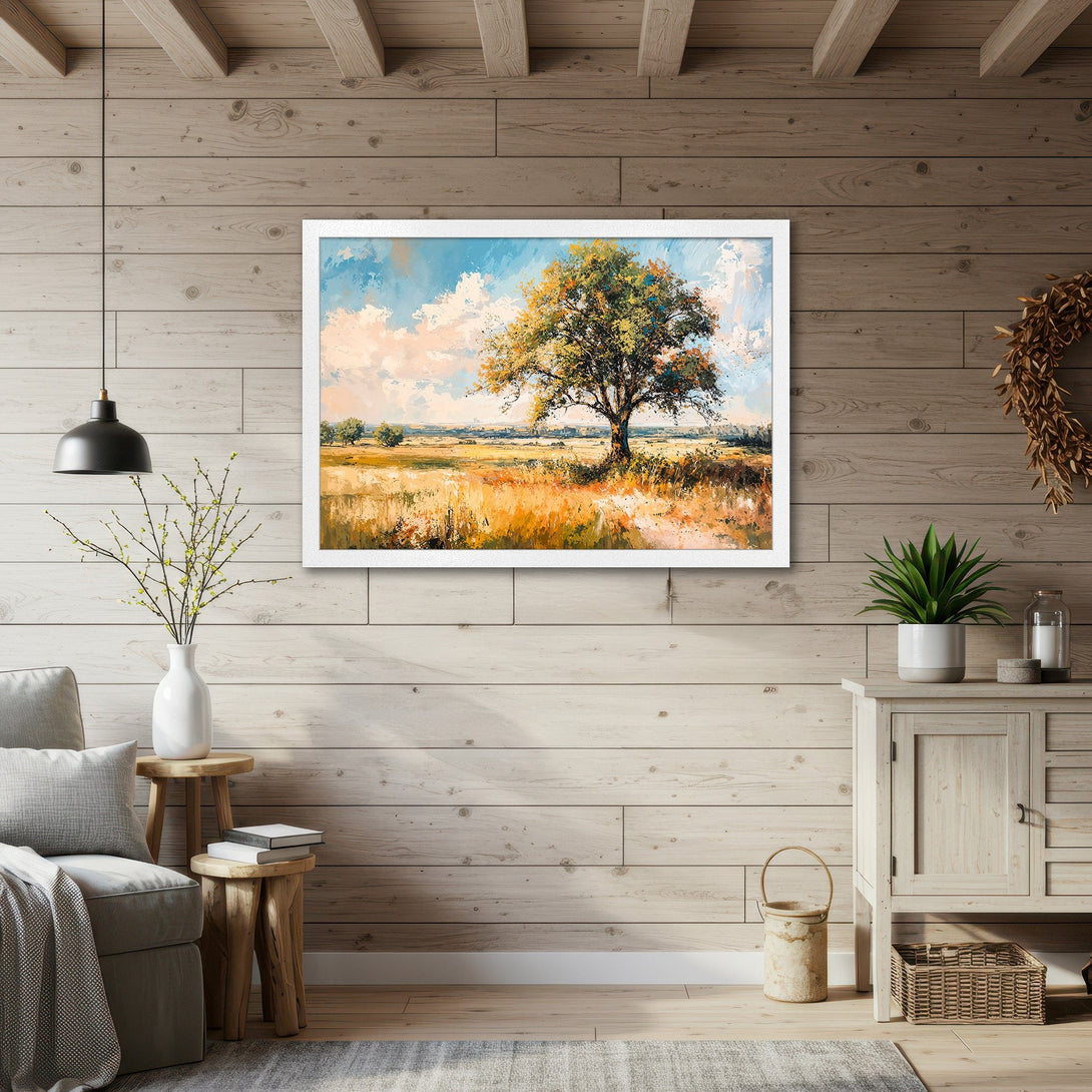 Framed Poster of a tree in a field, impressionistic style with warm, earthy tones and blue sky. Perfect wall art!