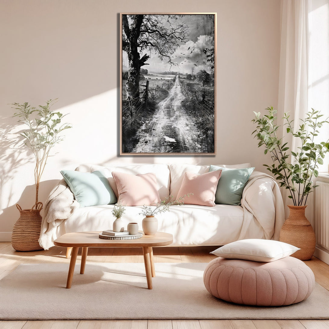 Framed Wall Art: Black and white landscape canvas print in a modern living room. Neutral color palette with pops of pink and blue.