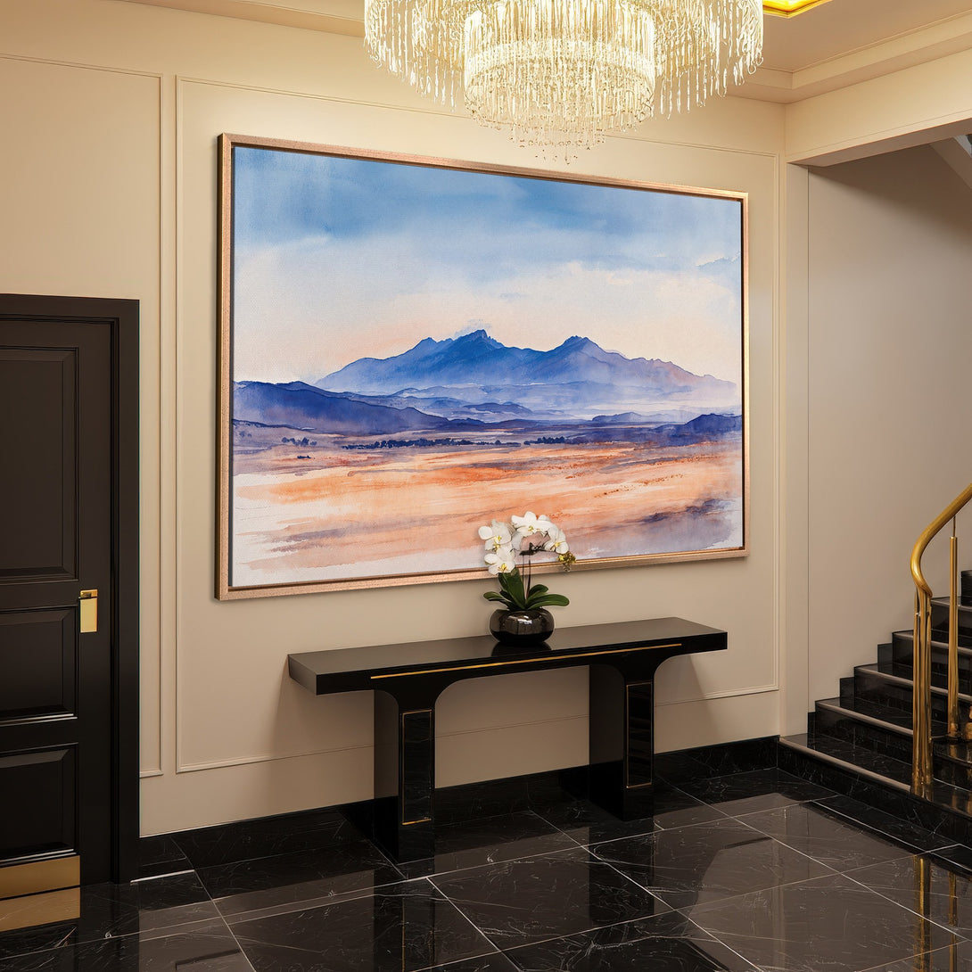 Framed Wall Art: Watercolor landscape Canvas Print with blue mountains and warm orange tones. Perfect for elegant home decor.