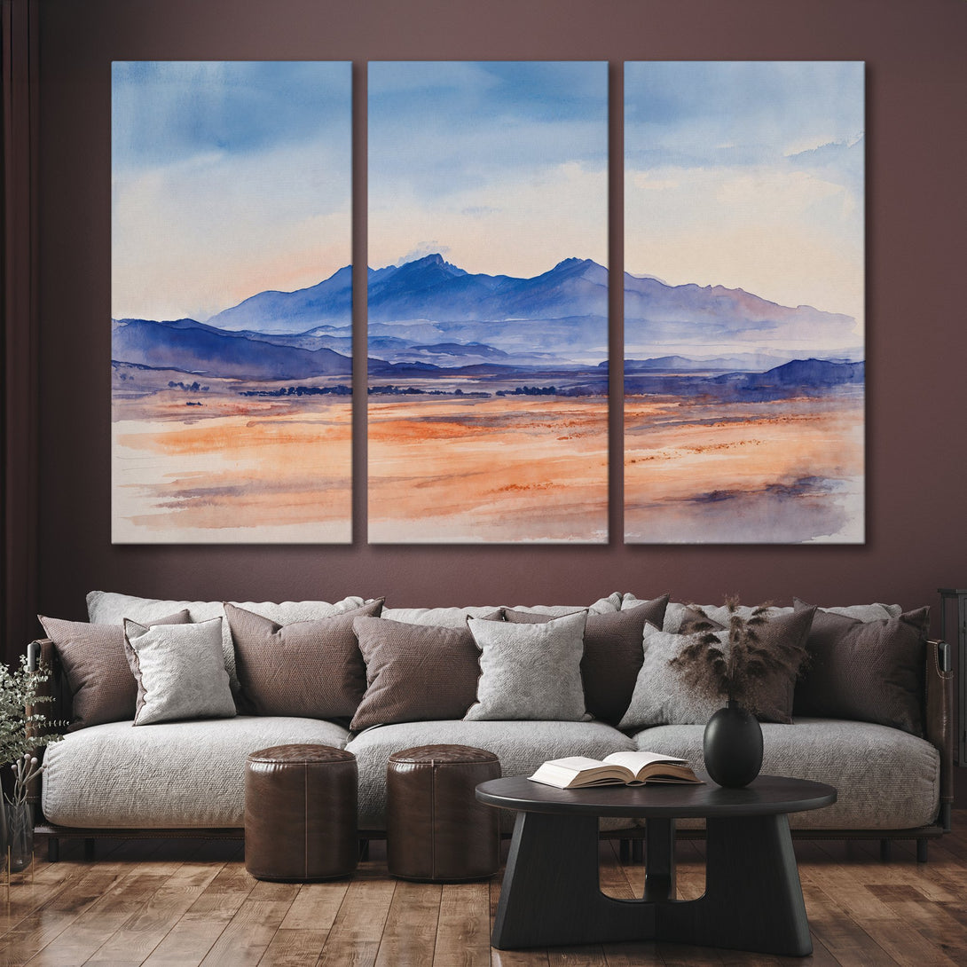 Canvas Print of a watercolor landscape with blue mountains and orange/beige foreground. Modern art for home decor.