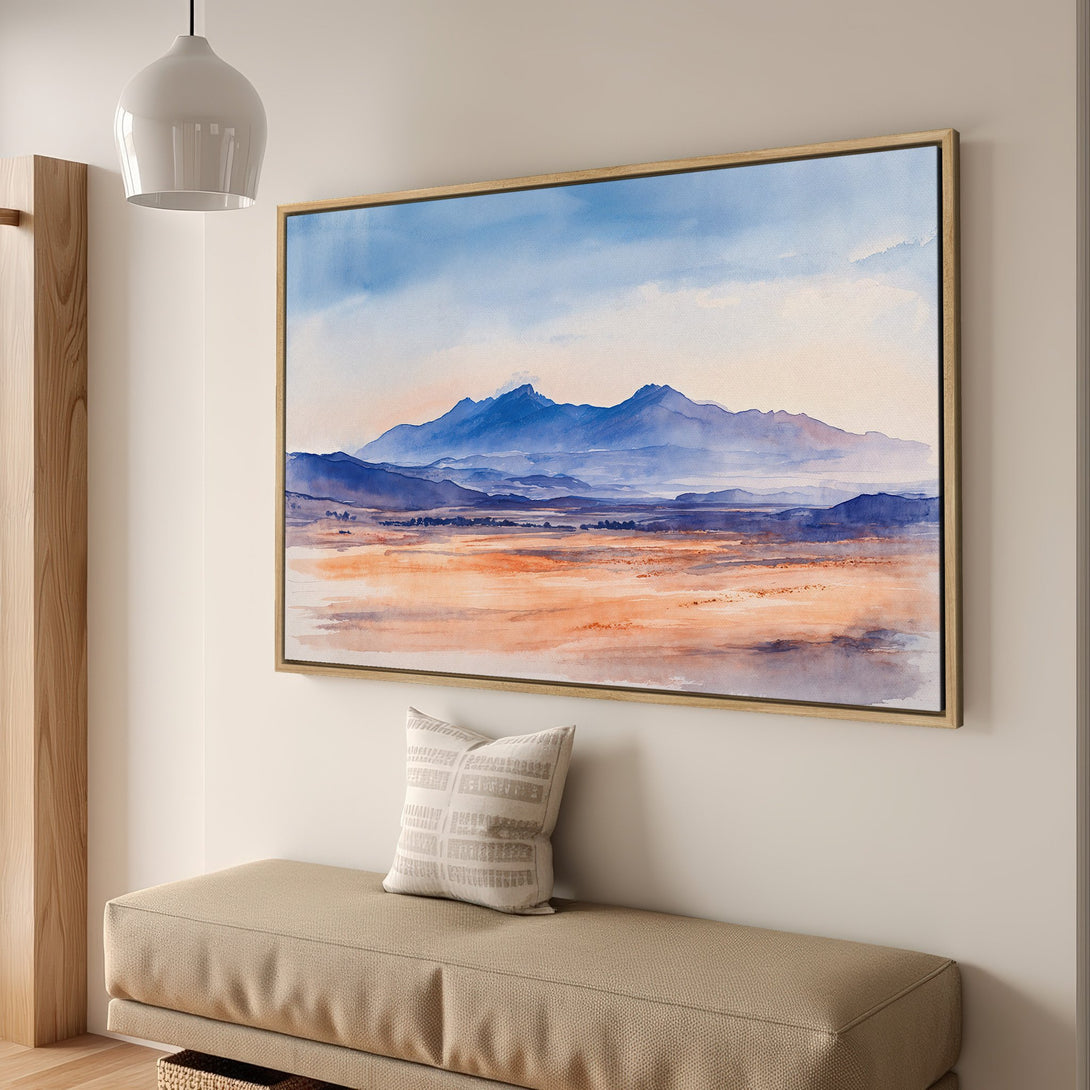 Framed Wall Art: Watercolor landscape Canvas Print with blue mountains and warm orange tones, perfect for adding a touch of nature to your home decor.