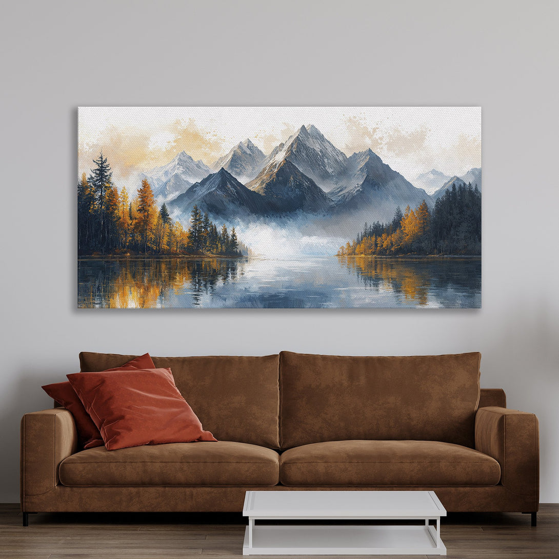 Framed Wall Art featuring a serene mountain lake landscape in a watercolor style. Earthy tones of blue, orange, and gold create a calming aesthetic.