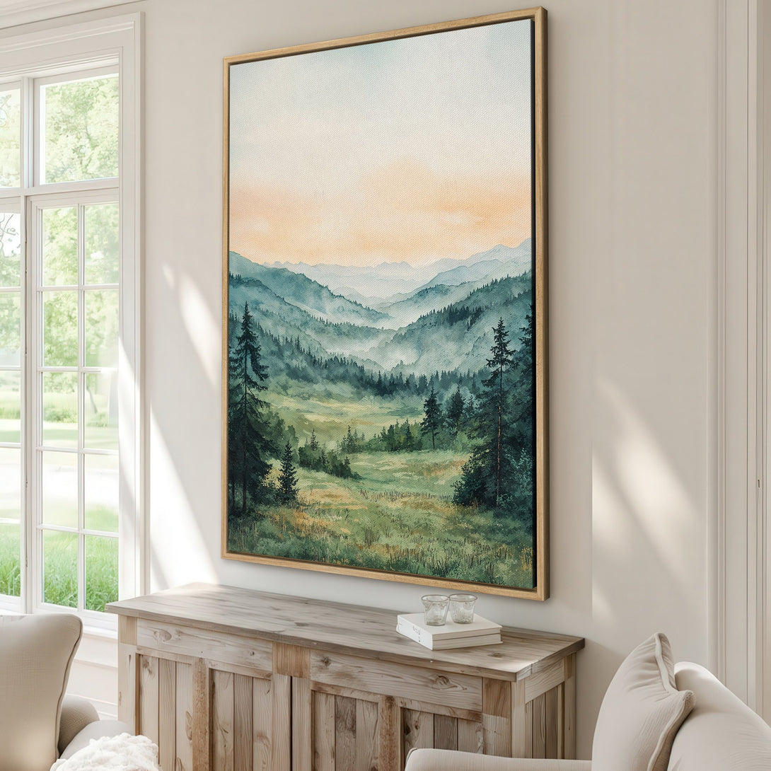 Framed Wall Art of a watercolor landscape with mountains and trees. Serene, nature-inspired art with a calming blue, green, and gold color palette.