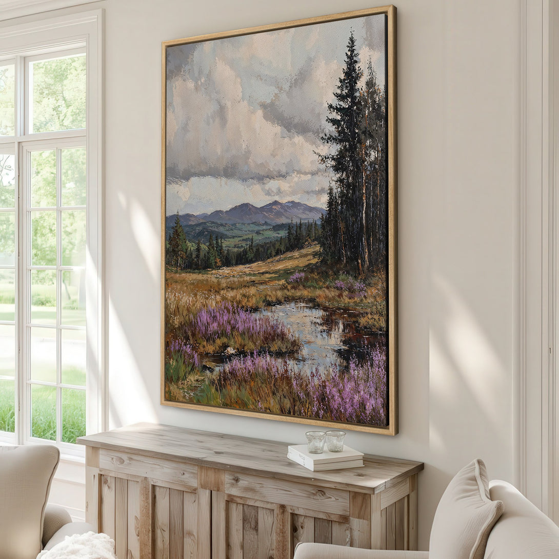 Framed Wall Art: Landscape painting with moody sky, forest, and purple flowers. Earthy tones create a calming ambiance. Perfect for living room or bedroom decor.