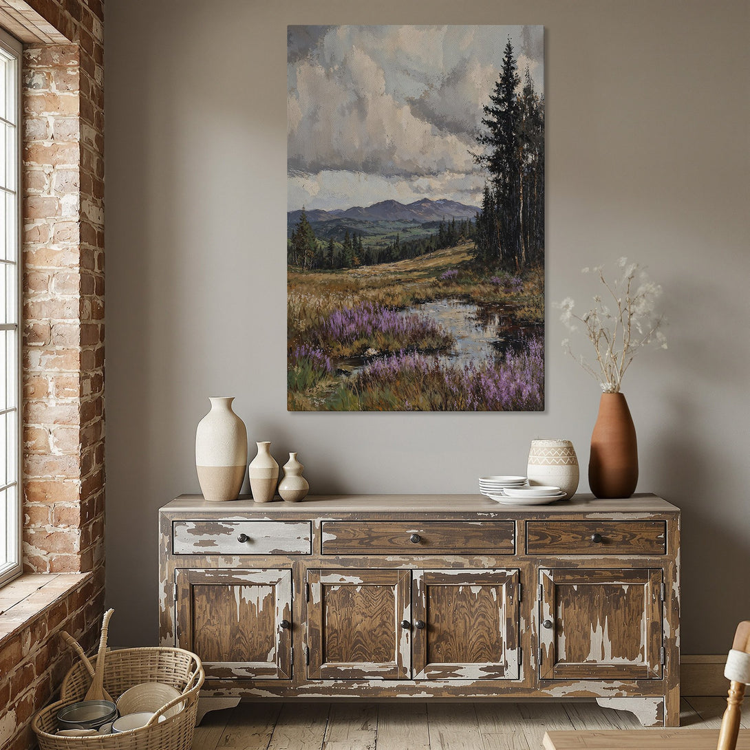 Framed Wall Art: Landscape painting with moody sky and purple flowers. Earthy tones and gold frame create a sophisticated, yet calming aesthetic. Perfect wall decor!