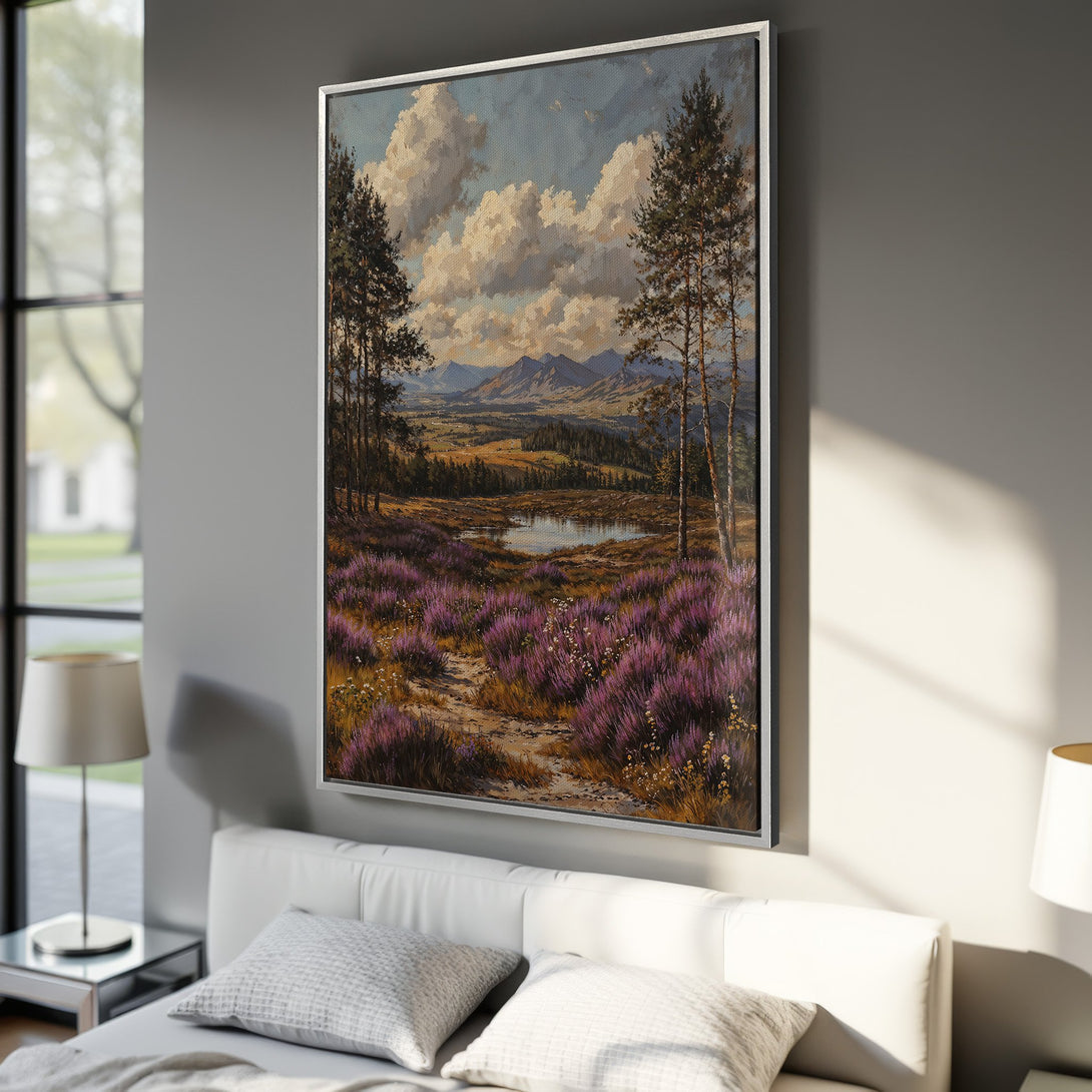 Framed Wall Art featuring a serene landscape painting with purple flowers, trees, and mountains. A beautiful canvas print with a warm, natural color palette.
