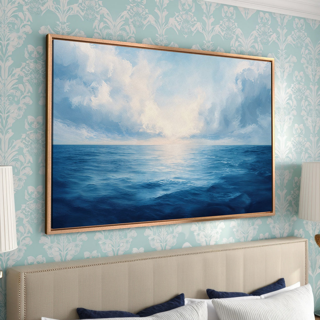 Framed Wall Art: Ocean landscape canvas print in blue tones. Coastal art for bedroom decor. Serene seascape painting.