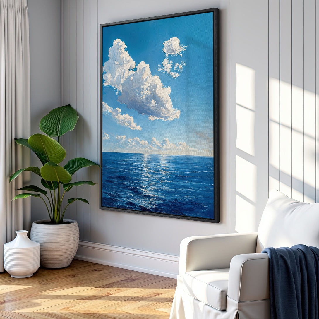 Framed Wall Art: Ocean scene canvas print with blue and white color palette. Coastal art for a serene home.