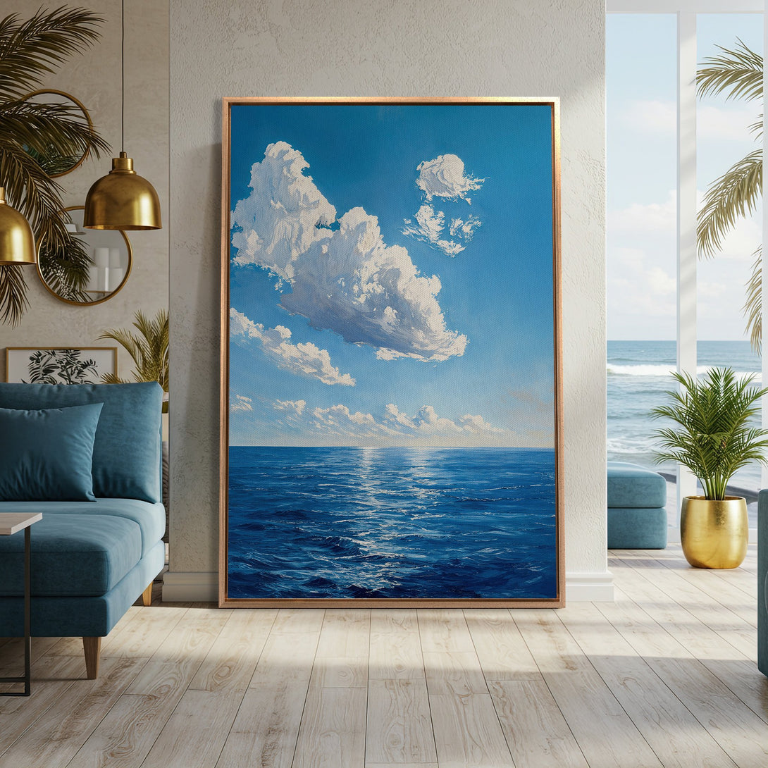 Framed Wall Art of ocean scene with blue and white hues. Coastal art for modern home decor. Canvas print in a serene interior setting.