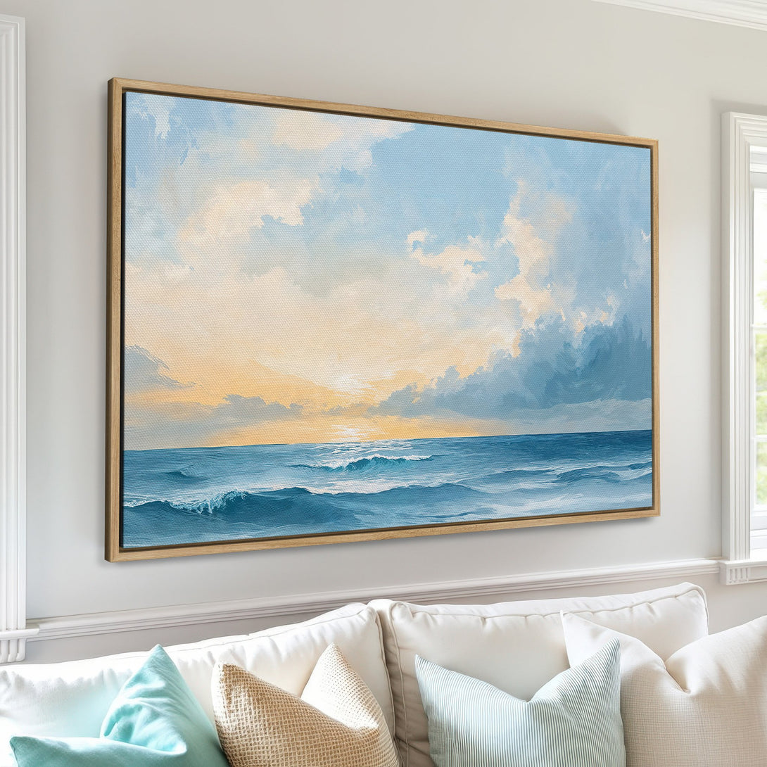 Framed Wall Art: Serene ocean scene Canvas Print in calming blue and gold tones. Coastal wall decor for a tranquil living room.