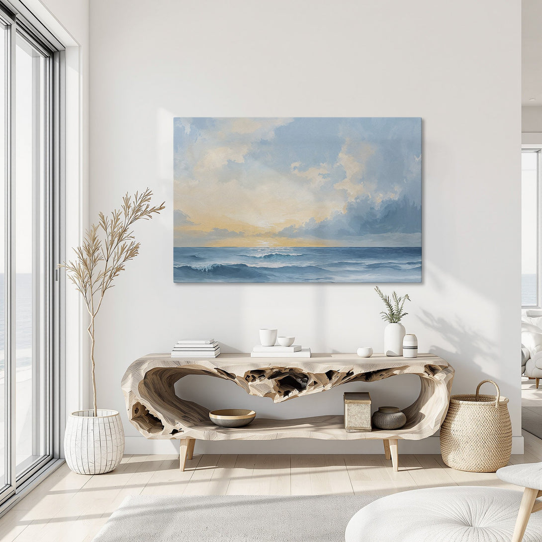Framed Wall Art featuring a serene ocean scene in blue and gold. Coastal style Canvas Print adds a touch of tranquility to any interior.