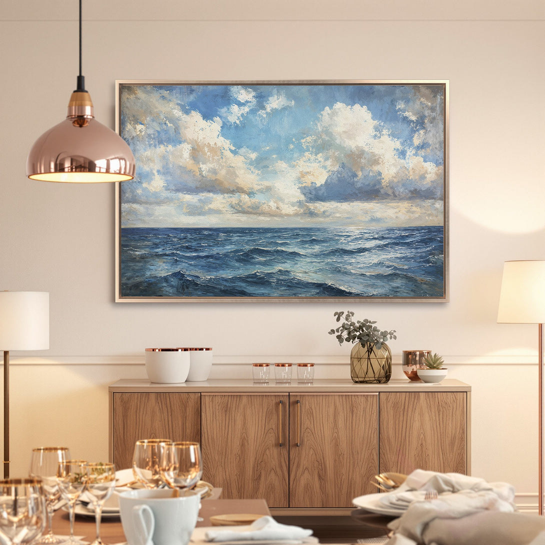 Framed Wall Art: Ocean waves canvas print in blue and white. Coastal artwork for a serene living room or dining space.