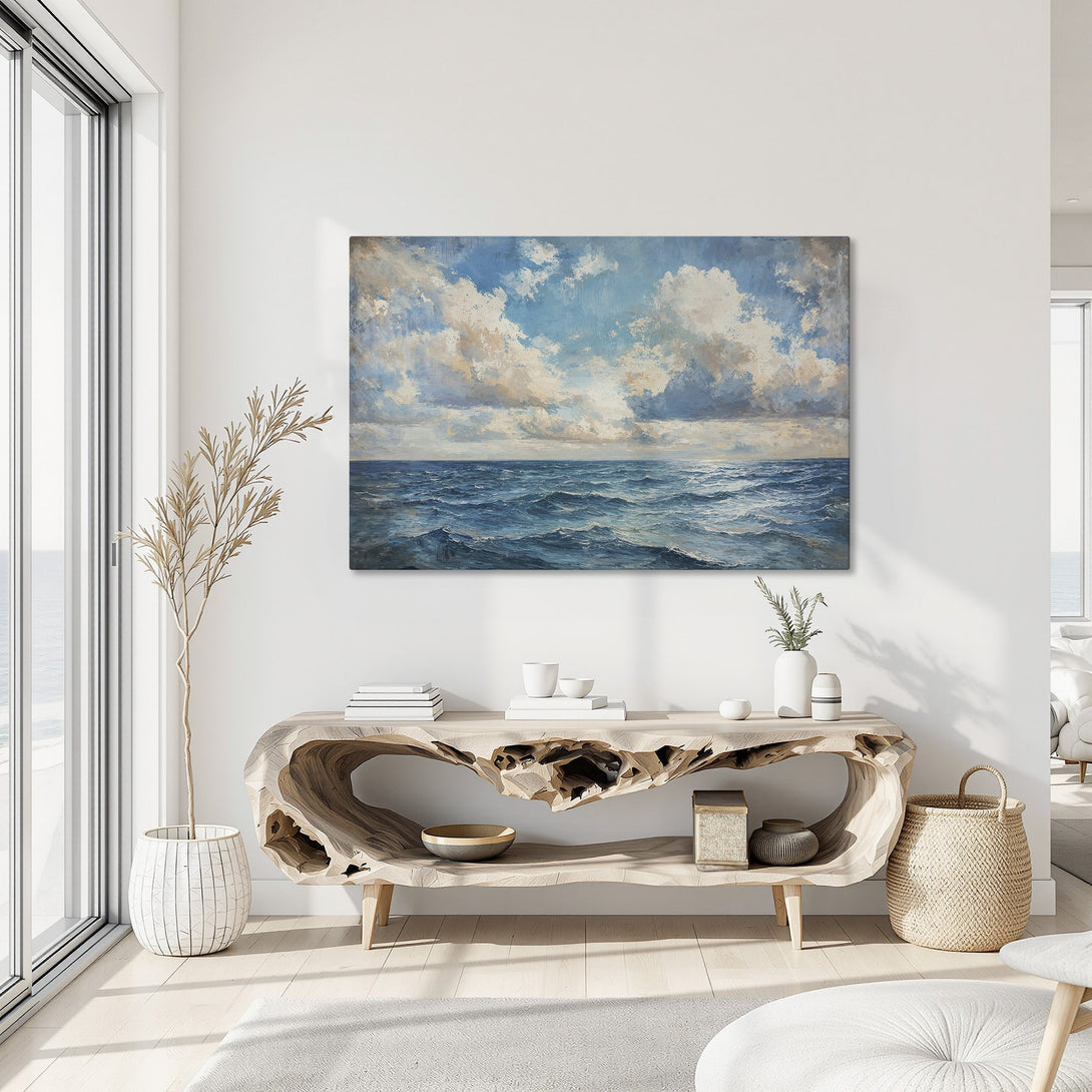Framed Wall Art: Ocean landscape Canvas Print with blue, white, and gold hues. Coastal art for a serene home. Shop now!