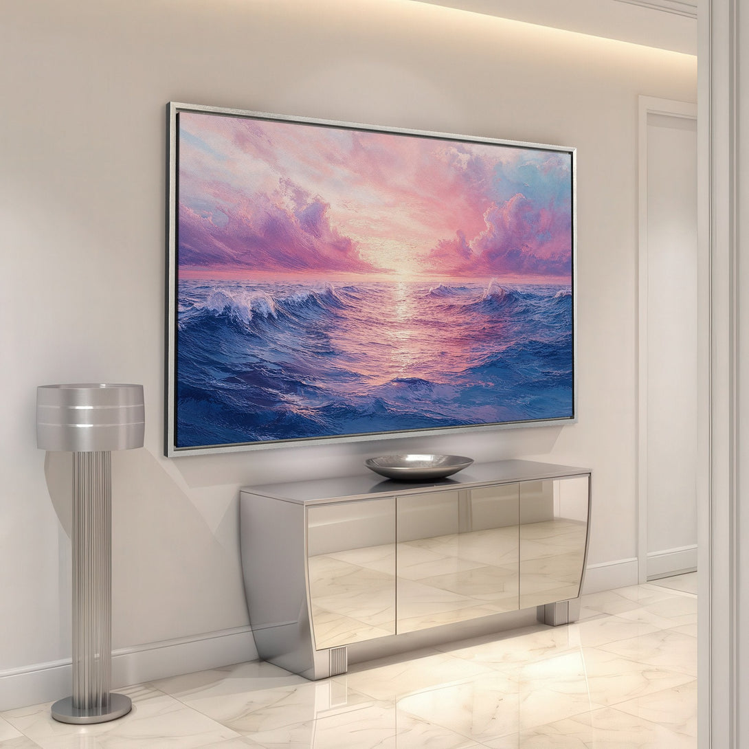 Framed Wall Art featuring a stunning ocean sunset in blue and pink hues. Add a touch of serenity to your home with this beautiful canvas print.