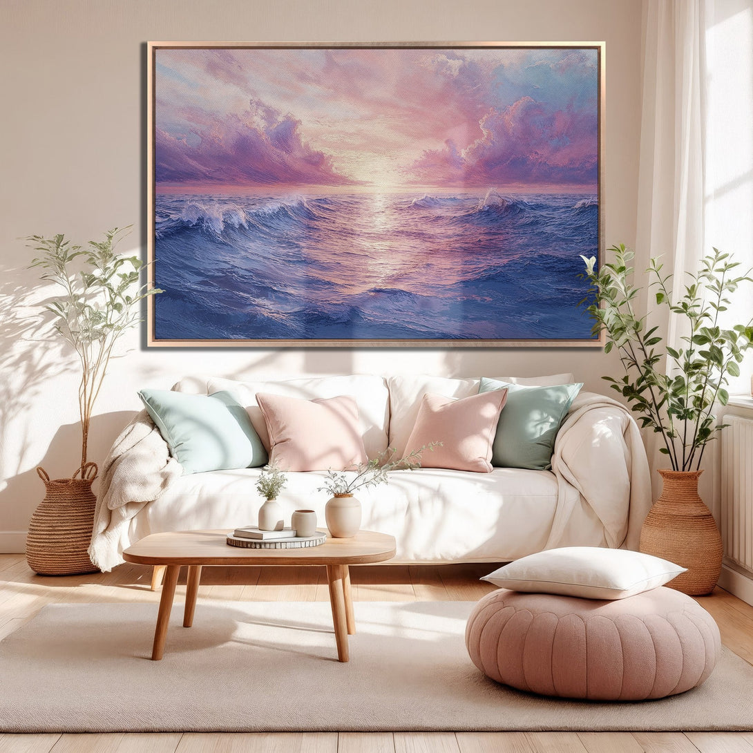 Framed Wall Art: Ocean sunset painting in pink and blue hues. Coastal style canvas print adds a serene touch to any living room.