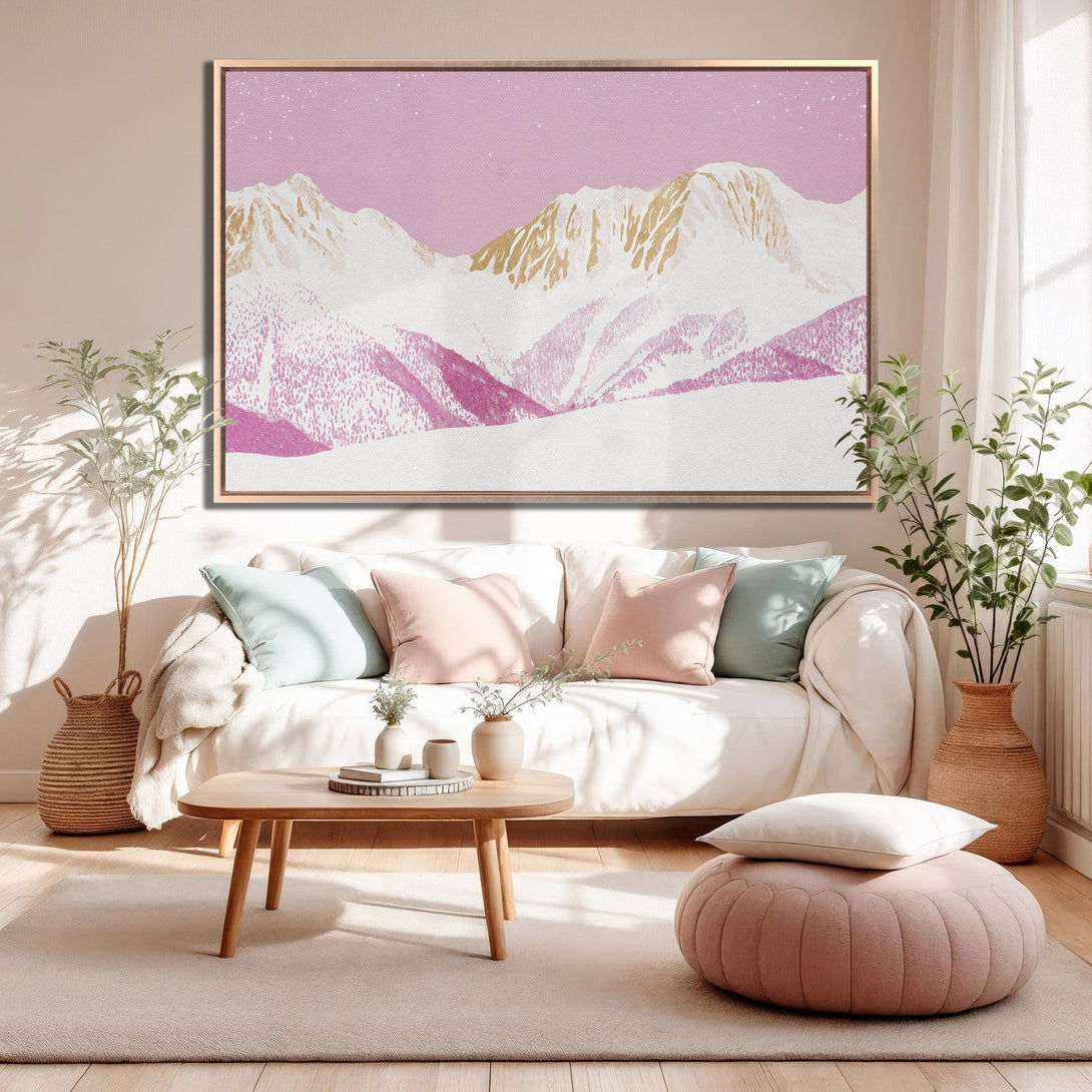 Framed Wall Art: Pink mountain landscape canvas print in a modern living room. Featuring a soft pink and gold color palette, perfect for home decor.