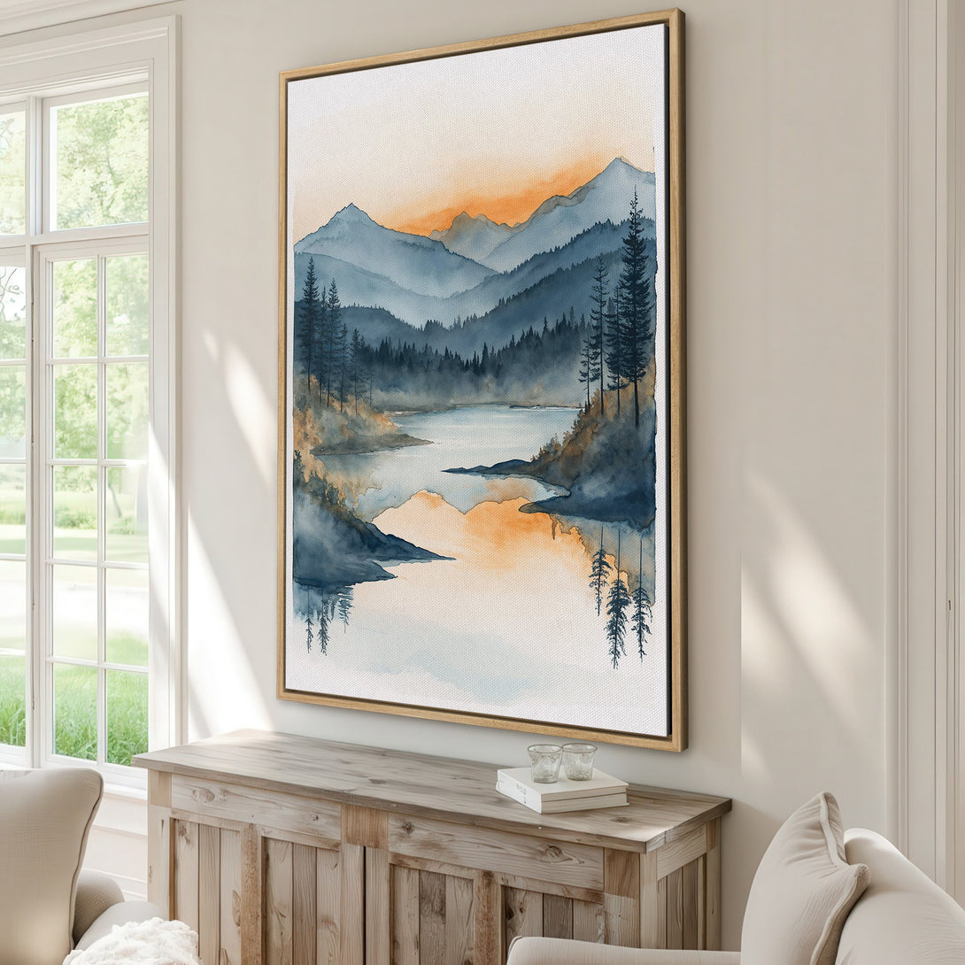 Framed Wall Art: Watercolor landscape Canvas Print with mountains, lake, and trees in a calming blue and orange palette. Perfect for modern home decor.