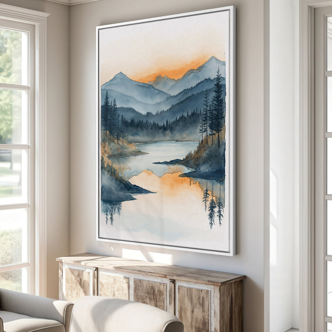 Framed Wall Art of a serene mountain lake scene in watercolor style, featuring blue, orange, and neutral tones. Perfect for adding a calming touch to any space.