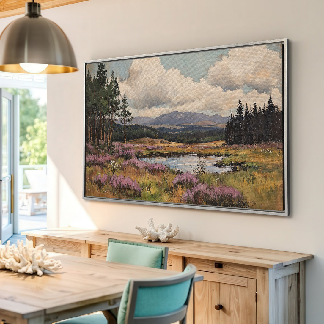 Framed Wall Art: Landscape Canvas Print with vibrant purple wildflowers, trees, and lake. Earthy tones create a calming, nature-inspired aesthetic.