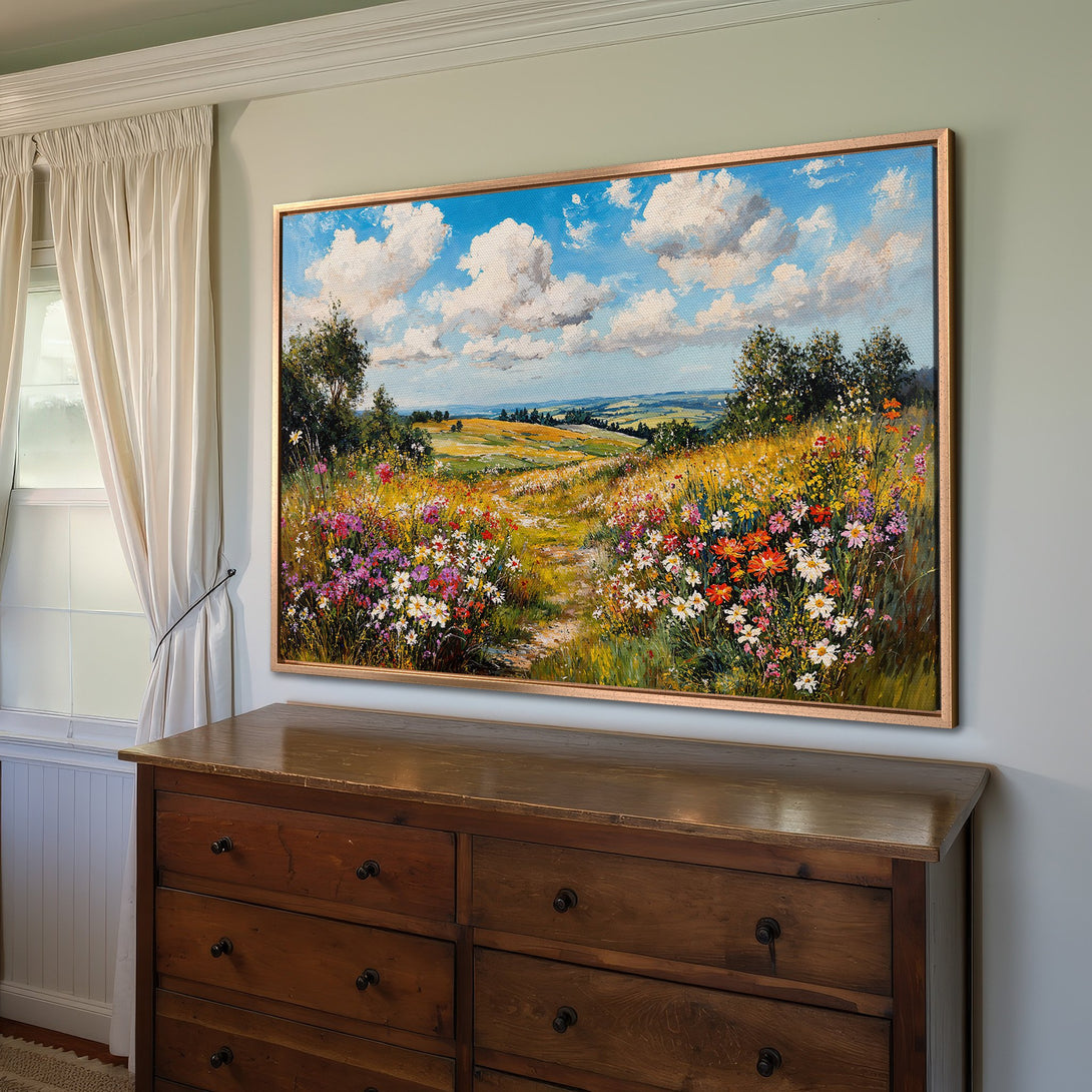 Framed Wall Art: Impressionist landscape Canvas Print with vibrant wildflowers & blue sky. Warm color palette adds a touch of nature to any room.
