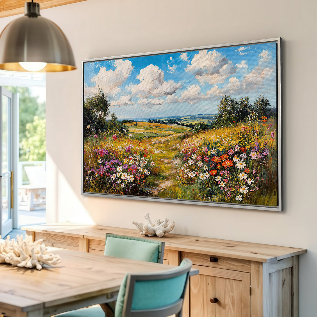 Framed Wall Art: Impressionistic landscape painting with vibrant wildflowers, blue sky, and a warm color palette. Perfect for adding a touch of nature to your home.